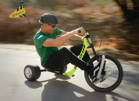 Rider on DXT Drift Trike Yellow One Size for downhill drifting with steel frame front freewheel BMX style super slider POM wheels
