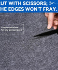 Person cutting Triple Layer Garage Floor Mat with Waterproof Barrier and Non Slip Backing for custom size garage use.