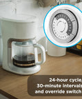 24-Hour Mechanical Outlet Timer Switch With Dual Grounded Plugs for Indoor Lighting, close-up of timer dial next to coffee maker