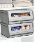 Stacked gray herringbone storage boxes with clear windows, part of Large Fabric Closet Shoe Storage Box With Clear Window 8 Pack.