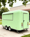 Kickstart Your Food Truck Hustle With This Turnkey Mobile Kitchen Trailer Featuring Plug And Play Electrical And Nsf Stainless Steel Counters Perfect For Sliders Coffee And Quick Cash Flow - rear view of green trailer