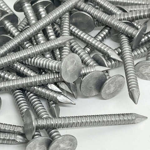 One Hundred Pack 1.25 Inch Ring Shank Aluminum Nails Flat Head Rust Resistant Finish Built For Vinyl Siding Roofing Fascia Trim Jobs Demanding Heavy Duty Performance