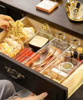 Organized drawer with Sleek 3 Compartment Acrylic Organizers For Bathroom Vanity Counters, storing makeup, brushes, and essentials.