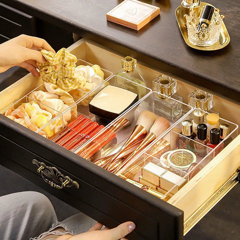 Organized drawer with Sleek 3 Compartment Acrylic Organizers For Bathroom Vanity Counters, storing makeup, brushes, and essentials.