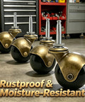 2 Inch Ball Caster Wheels Set Of 4 With Vintage Antique Brass Finish And Five Sixteenth Inch By One And A Half Inch Stem And Sleeve Heavy Duty Swivel Furniture Casters For Chairs Cabinets Tables And More, shown in a workshop background with text 'Rustproof & Moisture-Resistant'.