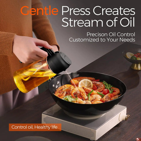 Smooth Operator Sixteen Oz Glass Olive Oil Spray Bottle With Dual Pour And Sprayer Function Drip Free Build For Grilling Roasting And Healthy Cooking Bpa Free Matte Black Kitchen Ace pouring oil over shrimp in a black pan.