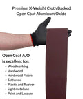 Person holding Tough As Nails Multipurpose Sanding Belts 6 By 89 Inch 120 Grit Aluminum Oxide designed for versatile sanding use.