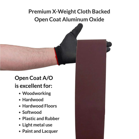 Person holding Tough As Nails Multipurpose Sanding Belts 6 By 89 Inch 120 Grit Aluminum Oxide designed for versatile sanding use.