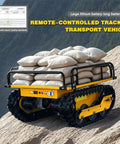 Remote Control Roller Dolly For Heavy Equipment Workhorse Style Battery Powered Load Moving Skate With Wireless Controller And 360 Degree Turntable For Quick Easy Industrial Warehouse Transport tracked loader carrying sacks on rocky slope