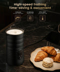Cafe-Style Barista-Grade Milk Foam Maker And Frother With Temperature Display, 350ml Capacity on kitchen counter with pastries.