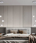 Raindrop Crystal Pendant Lights Set of 3 in bedroom setting, modern teardrop chandeliers with chrome finish.