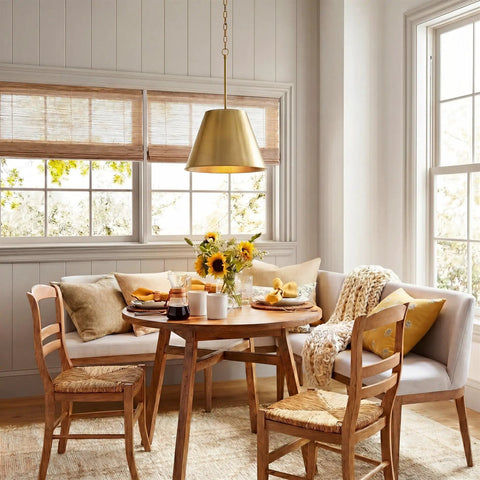 12 Inch Modern Gold Pendant Light With Tapered Metal Shade hanging over kitchen dining area with warm brass finish