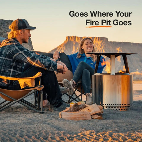 Bonfire Heat Deflector For Fire Pits, Boost Warmth And Comfort With A Wide Heat Radius, Durable 304 Stainless Steel, Portable Camp Essential with people around a fire pit in the desert