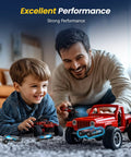 Father and son playing with red remote control cars, showcasing Heavy Duty Rechargeable Aa Lithium Batteries 8 Pack 1.5V 3000Mwh.
