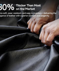 Hands holding black leather material for Dual Motor Electric Reclining Office Chair With Heat Massage And Ventilation
