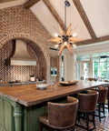 Six Light Sputnik Pendant Light In Black With Wood Accents Dope Rustic Modern Chandelier in a brick-walled kitchen