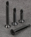 300 Pack Size 8 By One Inch Sheet Metal Self Tapping Screws Black Stainless Steel Flat Head Heavy Duty Self Drilling Fasteners Built Tough And Hella Strong Quick Job Site Kit on gray surface.