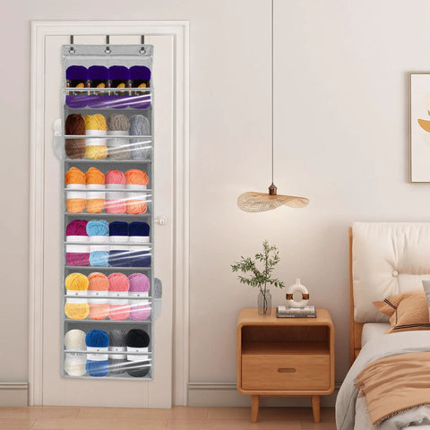 Over the Door Shoe Rack Organizer 6 Tier 66 Lbs Capacity 600D Oxford Fabric Grey 2 Pack on door, storing yarn balls.