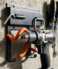 Beefy Heavy Duty Wall Mount Tool Organizer Rack With Adjustable Hooks holding a drill on a garage wall
