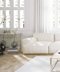 Large Air Circulator Fan With Four Speeds For Whole Room Cooling, 90 Degree Tilt, on floor near white sofa in bright living room