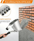 Badass Pneumatic Mortar Sprayer With Four Jet Nozzles spraying cement plaster on a brick wall for efficient wall texturing.