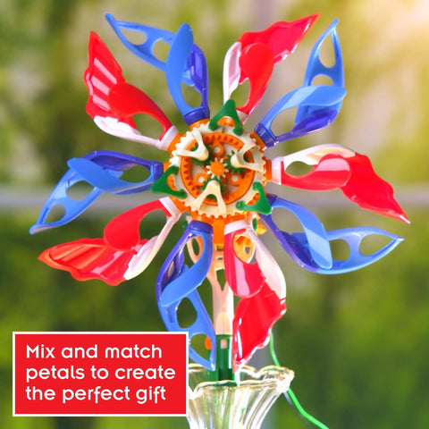 SolarFlower Ruby Ripple STEM Kit motorized solar flower with colorful plastic petals and gears in a clear vase