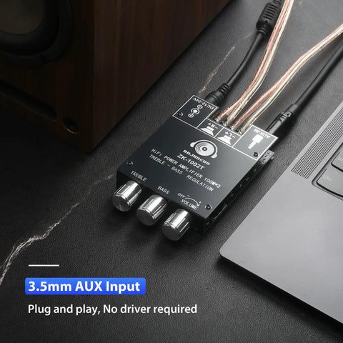 Two Channel 100W Per Side Amplifier Board For DIY Wireless Speakers With Treble And Bass Control DC Nine To Twenty Four Volt Bluetooth And AUX Inputs Password Free Stereo Amp Board shown connected to a laptop and speaker