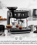 Fully Automatic Oracle Jet Espresso Machine With Auto Microfoam Steamer And Custom Cold Brew Options For Modern Kitchen Spaces, black stainless design showing espresso flow.