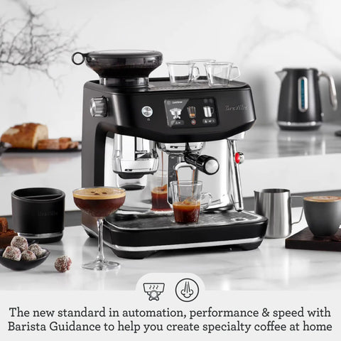 Fully Automatic Oracle Jet Espresso Machine With Auto Microfoam Steamer And Custom Cold Brew Options For Modern Kitchen Spaces, black stainless design showing espresso flow.