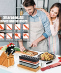 Couple in kitchen using Pro Whetstone Knife Sharpening Stone Set with non-slip base and leather strop, showing multiple grit levels