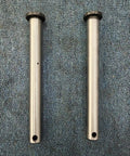 Top Notch 2-Piece Mini Excavator Bucket Pin Set Featuring 25mm Diameter By 250mm Length Replacement Pivot Pins on textured background.