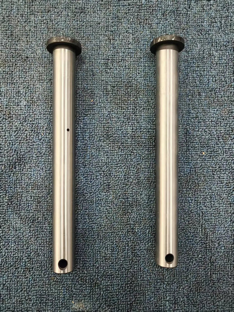 Top Notch 2-Piece Mini Excavator Bucket Pin Set Featuring 25mm Diameter By 250mm Length Replacement Pivot Pins on textured background.