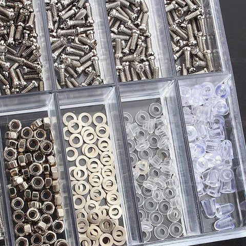 Assorted micro screws, nuts, and washers in a plastic tub for electronics repair. Badass Slick Stainless Steel Micro Screws And Nuts Kit For Eyeglasses Smartwatches Phones Tablets Laptop Repair Assorted Tiny Fasteners Heavy Duty Toolbox Must Have Accessory.