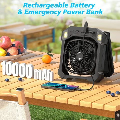 Solar Powered Camping Fan With 10000mAh Battery USB Rechargeable Portable on table charging phone