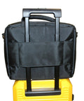 Compact Scuba Diving Regulator Bag for Travel with suitcase style buckle, attached to yellow luggage, durable exterior visible