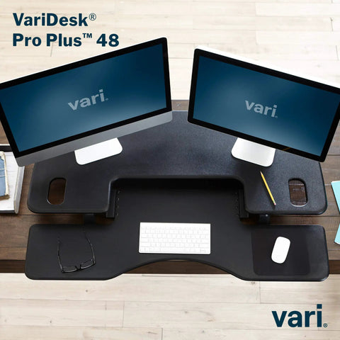 Dual Monitor Sit Stand Desk Riser 48 Inch Wide Desk Converter With 11 Height Settings Fully Assembled Spring Loaded Lift Lower Keyboard Deck Black Finish For Home Office And Workspaces shown with dual monitors and keyboard
