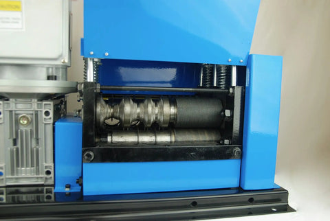 Close-up of WS260 Wire Stripping Machine showing auto feed and cut rollers, heavy-duty steel construction for copper wire.