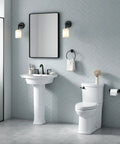 Slick Skirted Two Piece Chair Height Elongated Toilet With Seat 1.28 Gpf Low Flow WaterSense Certified 12 Inch Rough In in modern bathroom.