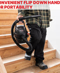 Person carrying One Gallon Wet Dry Vacuum Micro 1.0 Peak HP With 1.25 Inch By 4 Foot Hose And 6 Foot Cord down stairs