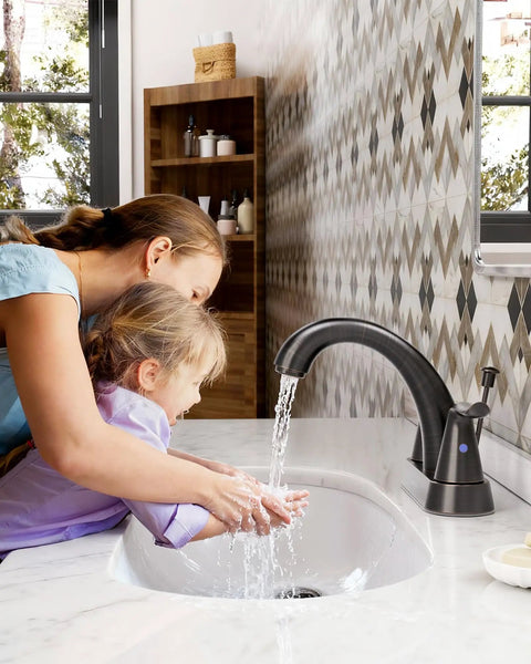 Oil Rubbed Bronze 4 Inch Centerset Bathroom Faucet With Two Handles And Lift Rod Drain Assembly in use at vanity sink