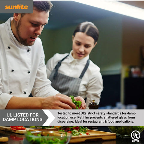 Chefs preparing meal in kitchen, highlighting shatterproof glass safety for LED T5 Plug And Play Light Tube Three Foot 18 Watt 2100 Lumens Dual End Connection Mini G5 Bi Pin Base Electronic Ballast Compatible UL Listed 4000K Cool White Ten Pack Instant On No Buzz Flicker Free Shatterproof Glass.