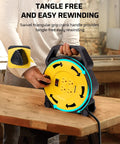 Person using Retractable 25 Feet Extension Cord Reel With 4 Grounded Outlets And 13 Amp Breaker, 16/3 SJTW Cord
