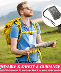 Hiker with map and yellow backpack; inset of Survival Compass Kit For Camping And Hiking With Thermometer Hygrometer Led Light Whistle.