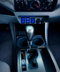 Interior view showing Flux Capacitor Push Button Switch 12V LED SPST With Wire Kit Replacement installed in vehicle console