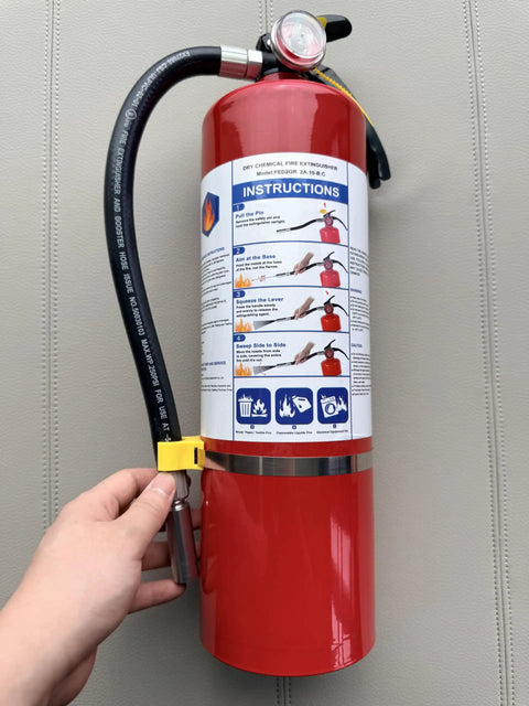 Two Pack Five Pound ABC Dry Chemical Fire Extinguisher With Foolproof Grab And Go Lever displayed with instructions and hose.