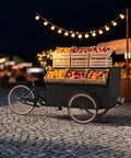 Kickstart Your Curbside Hustle With This Heavy Duty Outdoor Coffee Cart Featuring A Wide Canopy Sun Shade And Smooth Rolling Wheels For Mobile Vending Or Pop Up Market Sales with fruit crates.