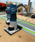 Guide Rail Adapter Compatible With Bosch Colt 1Hp Router For Track Saw Systems on polished MDF work surface
