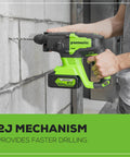 Person using Beast Of A Cordless Rotary Hammer Drill With Brushless 24V Motor 2 Joule Impact SDS Plus on concrete wall