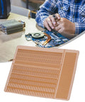 Copper Wire PCB Repair Pad For Phone IC Spot Soldering And BGA Maintenance Traceless Rework Tool on desk with motherboard