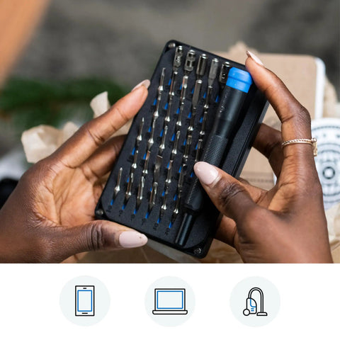Hands holding Moray Driver Kit: 32 Precision Bits For Smartphones, Game Consoles, And Small Electronics Repair